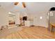 Cozy living space with wood floors and access to bedroom at 1322 Ne 53Rd St, Ocala, FL 34479