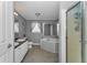 Bathroom with tub, shower, and double sink vanity provides lots of space at 14276 Se 61St Ave, Summerfield, FL 34491