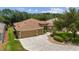 Expansive home with a three-car garage and beautiful landscaping at 1429 Sw 160Th Ln, Ocala, FL 34473