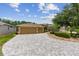 Beautiful single-story home featuring a three-car garage and meticulously landscaped front yard at 1429 Sw 160Th Ln, Ocala, FL 34473
