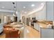 Kitchen featuring granite countertops, stainless appliances, and a breakfast bar with leather seating at 1429 Sw 160Th Ln, Ocala, FL 34473
