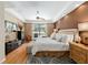 Comfortable main bedroom with large sliding door to the lanai, and neutral decor at 1429 Sw 160Th Ln, Ocala, FL 34473