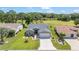 Beautiful aerial view of the home showcasing its landscaping and golf course surroundings at 15119 Sw 14Th Avenue Rd, Ocala, FL 34473
