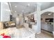 Bright kitchen with white cabinets, granite countertops, and modern appliances at 15119 Sw 14Th Avenue Rd, Ocala, FL 34473