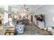 An expansive living area connecting the kitchen, dining room, and entry for seamless entertaining and living at 15119 Sw 14Th Avenue Rd, Ocala, FL 34473