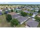 Residential homes in a neighborhood offering lush greenery, well-manicured lawns, and tree-lined streets at 1748 Sw 157Th Place Rd, Ocala, FL 34473