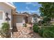 Front yard featuring a brick driveway, well-maintained landscaping, and cozy entrance at 1748 Sw 157Th Place Rd, Ocala, FL 34473