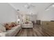 Spacious living room featuring wood floors, recessed lighting, and neutral decor at 1748 Sw 157Th Place Rd, Ocala, FL 34473