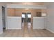An open floor plan living room with sliding glass doors to the outside at 21 Pecan Course Cir, Ocala, FL 34472