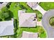 Aerial shot of the home surrounded by lush greenery and well-maintained landscaping at 3141 Roswell Rd, The Villages, FL 32162