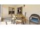 Enclosed patio offers a cozy spot for outdoor dining and relaxation at 3141 Roswell Rd, The Villages, FL 32162