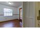 Bright breakfast nook with wood-look flooring and natural light from a large window at 3295 Se 56 Ave, Ocala, FL 34480