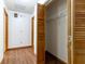 Walk-in closet with hardwood floors, white walls, and a single shelf at 3295 Se 56 Ave, Ocala, FL 34480