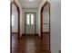 Inviting foyer with wooden trim and archways leading to other rooms at 3295 Se 56 Ave, Ocala, FL 34480