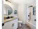 Updated bathroom with enclosed shower and tub, nice tile, and modern hardware and fixtures at 346 Emerald Rd, Ocala, FL 34472
