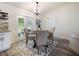 Cozy dining area adjacent to kitchen with access to outdoor patio area at 346 Emerald Rd, Ocala, FL 34472