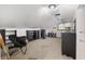 Finished attic area with ceiling fan, carpeted floor, and multiple dressers at 3823 Se 49Th St, Ocala, FL 34480