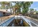 Exterior view of the backyard and partially renovated pool at 3823 Se 49Th St, Ocala, FL 34480