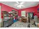 Eclectic pink bedroom with unique floor tiles, window, ceiling fan, and closet at 3823 Se 49Th St, Ocala, FL 34480