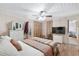 Cozy bedroom with wood-look flooring, ceiling fan, and built-in dresser at 3823 Se 49Th St, Ocala, FL 34480