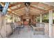Inviting cabana interior featuring wood construction, ample seating, and an open, airy design with plenty of natural light at 3823 Se 49Th St, Ocala, FL 34480