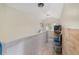 Upstairs hallway with a window, a white railing, natural light and storage at 3823 Se 49Th St, Ocala, FL 34480