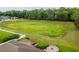 Spacious lot offers plenty of privacy with views of mature trees and lush green space behind the property at 4015 Se 22Nd St, Ocala, FL 34471