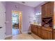 Bathroom vanity leads to a doorway to the adjacent bedroom at 4015 Se 22Nd St, Ocala, FL 34471
