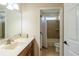 The bathroom features a sink and a shower-tub combo with window at 4015 Se 22Nd St, Ocala, FL 34471