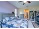 A secondary angle shows the bedroom leading into the en-suite bath at 4015 Se 22Nd St, Ocala, FL 34471