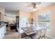 Bright breakfast nook featuring an elegant ceiling fan and plenty of natural light at 4015 Se 22Nd St, Ocala, FL 34471