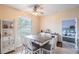 A sunny dining area with white accents, next to the Primary bedroom at 4015 Se 22Nd St, Ocala, FL 34471