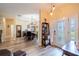 Inviting foyer with high ceilings, wood floors and decorative chandelier at 4015 Se 22Nd St, Ocala, FL 34471