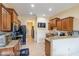 Kitchen with stainless appliances, ample cabinetry, and adjacent hallway at 4015 Se 22Nd St, Ocala, FL 34471