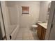 Clean bathroom featuring a shower/tub combo, vanity, and tiled flooring at 4460 Sw 44Th St, Ocala, FL 34474