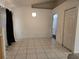 Bright dining room with arched doorway, tiled floor, and modern lighting at 4460 Sw 44Th St, Ocala, FL 34474
