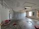 A messy, unfinished two car garage at 4460 Sw 44Th St, Ocala, FL 34474