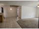 Spacious living room featuring tile and carpet flooring and an open layout at 4460 Sw 44Th St, Ocala, FL 34474