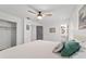 Bright bedroom with ceiling fan, closet, and ensuite bathroom at 4601 Se 18Th Ave, Ocala, FL 34480