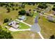 Areal view of a sprawling estate with manicured lawns at 5815 Ne 70Th St, Silver Springs, FL 34488