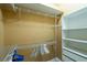 Large walk-in closet featuring wire shelving and a built-in storage unit at 5815 Ne 70Th St, Silver Springs, FL 34488