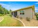 Spacious backyard showcasing a screened-in lanai and meticulous landscaping with decorative rock beds at 7917 Sw 85Th Loop, Ocala, FL 34476