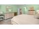 Spacious bedroom featuring a large bed, ample storage, and a calming ambiance for restful nights at 7917 Sw 85Th Loop, Ocala, FL 34476