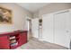 Inviting hallway featuring a sliding door console and an open, airy feel leading to other rooms at 7917 Sw 85Th Loop, Ocala, FL 34476