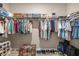 Spacious walk-in closet featuring ample shelving, hanging space, and room for storage containers at 7917 Sw 85Th Loop, Ocala, FL 34476