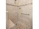 Walk-in shower with tiled walls and floor, a built-in bench and shower niche, and a grab bar at 7917 Sw 85Th Loop, Ocala, FL 34476