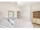 Bedroom features a window, closet, ceiling fan, and neutral decor at 8303 Sw 82Nd Cir, Ocala, FL 34481