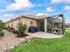 The exterior of the home includes a patio area, landscaping, and a screened-in porch at 8447 Sw 82Nd Loop, Ocala, FL 34481