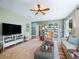 Inviting living room with hardwood floors and lots of natural light at 8447 Sw 82Nd Loop, Ocala, FL 34481