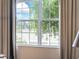 Lovely window view with natural light filtering through the trees at 8447 Sw 82Nd Loop, Ocala, FL 34481